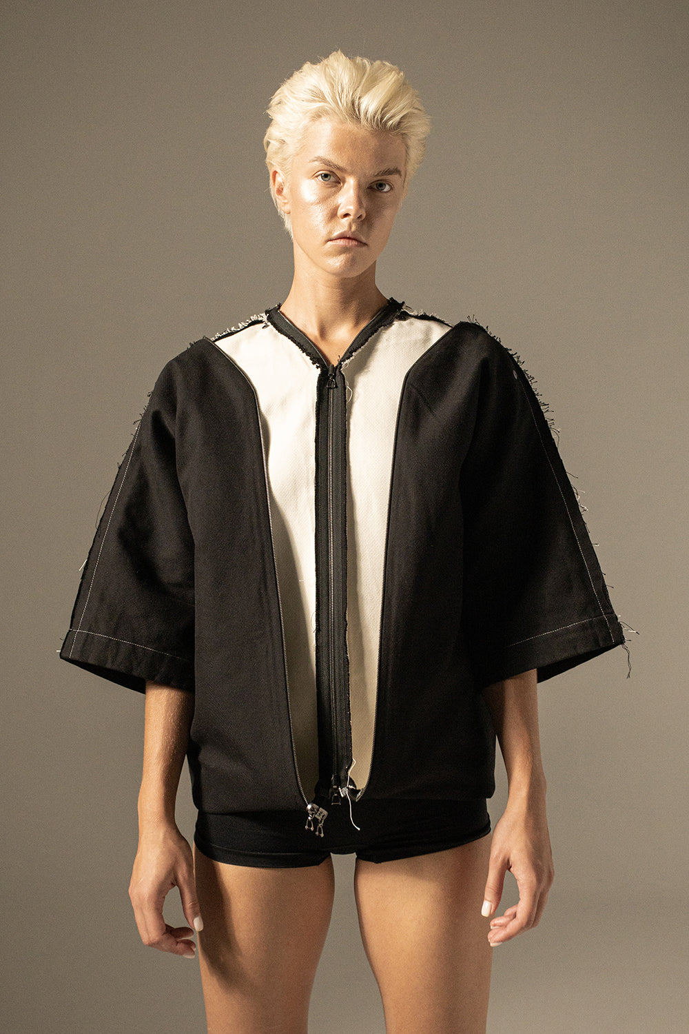 DZHUS Double-faced as a black and cream jacket