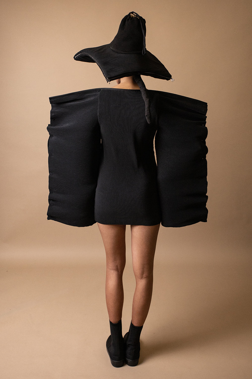 DZHUS Projection as a dress with a hat back look