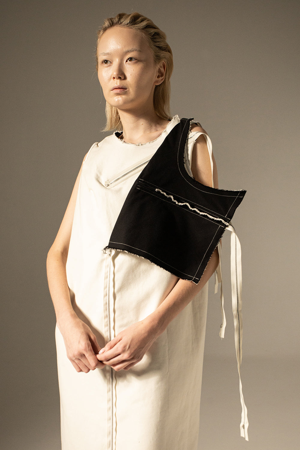 DZUS Substitute as a dress in white with a half-vest